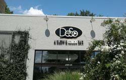 DeSo's building sign with external lighting