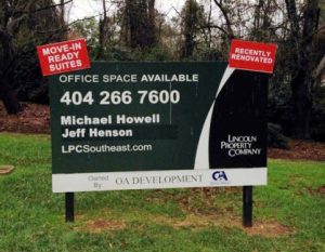 A post and panel sign that was updated with other signage for Lincoln Properties